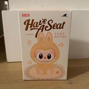 Pop Mart Labubu 'Have A Seat' Figurine - Hehe
